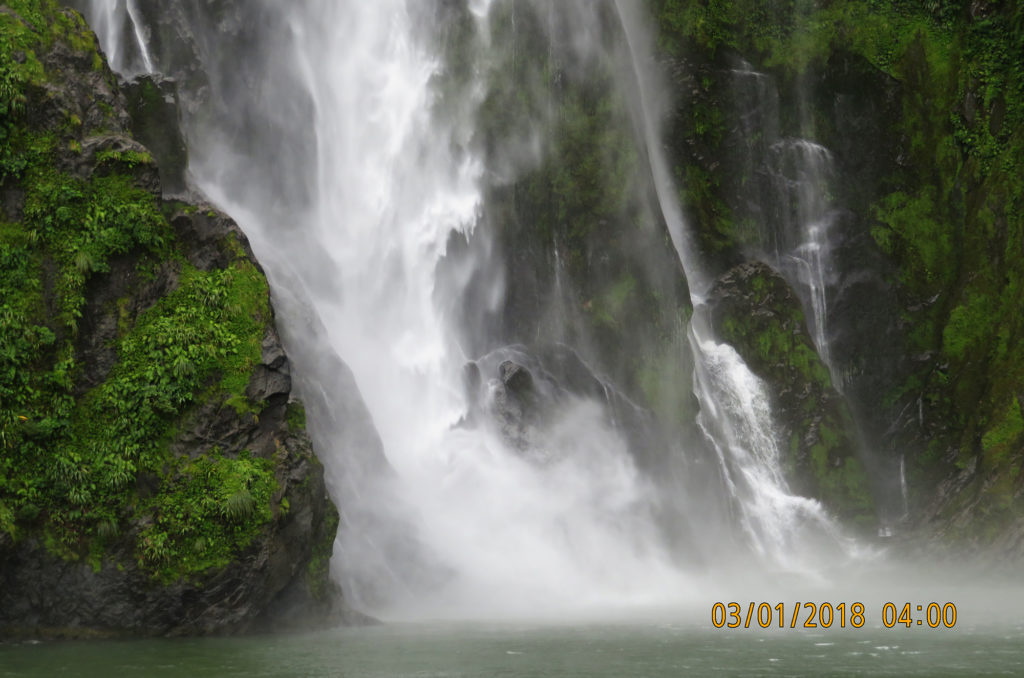 milford sound waterfall new zealand