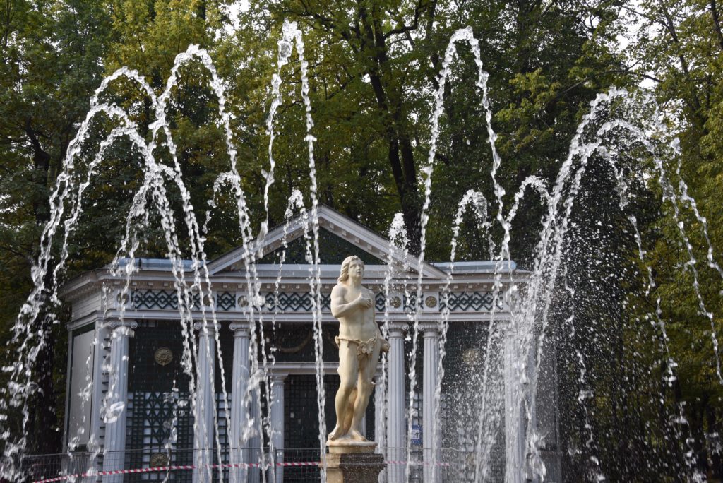 statue with water fountain