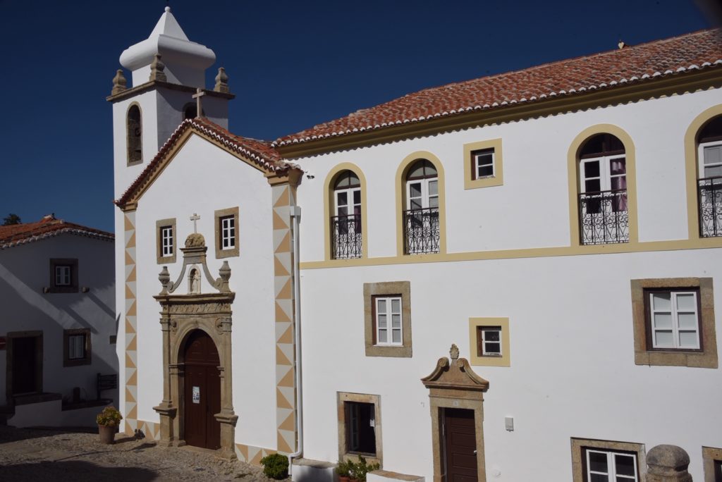 white building with tan frame outline