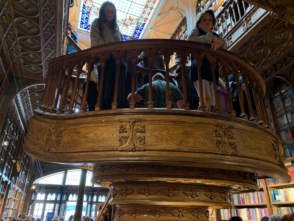 people looking down stair case