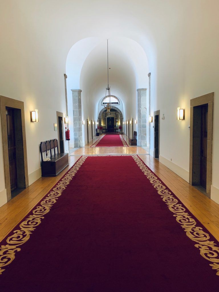 hallway with carpets