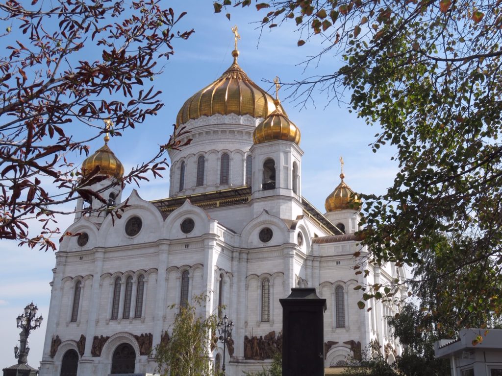 white building with gold crosses on top