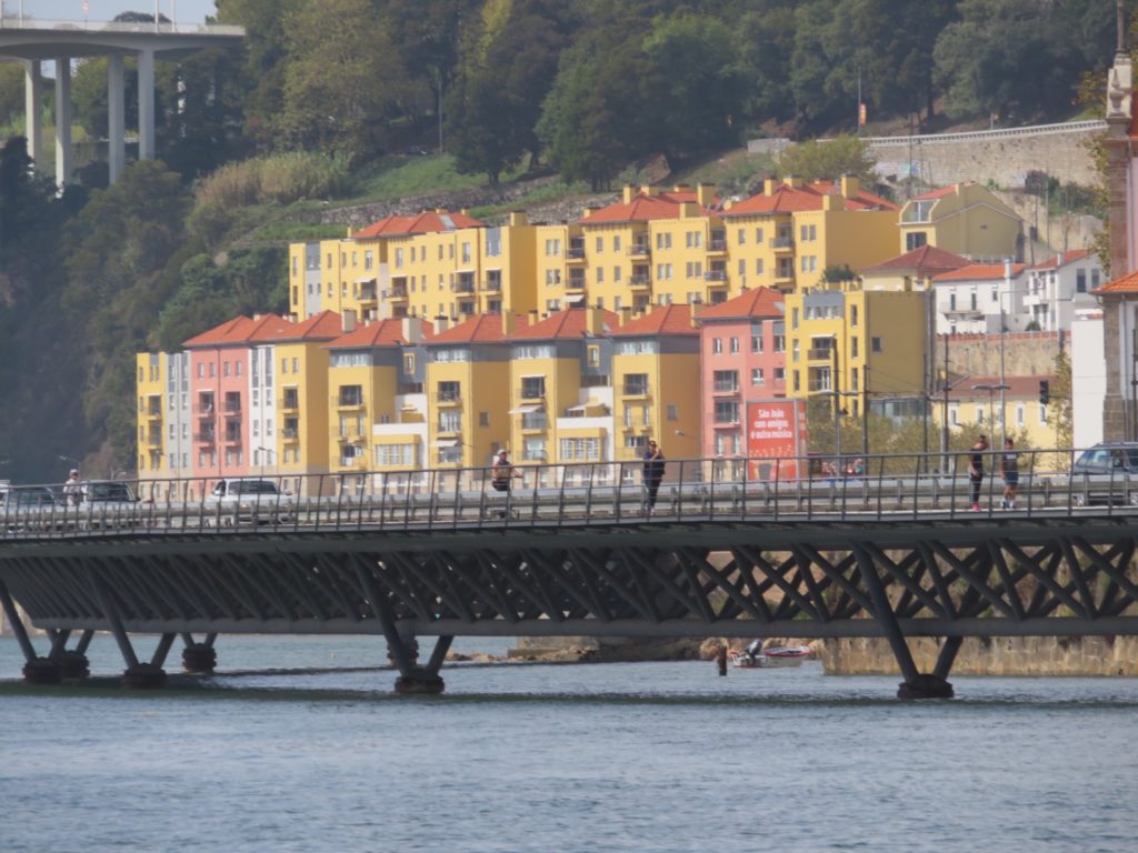 bridge with yellow buildings