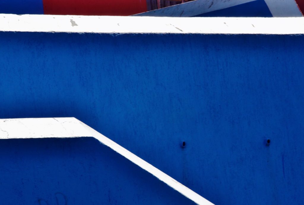 blue building with white stripes