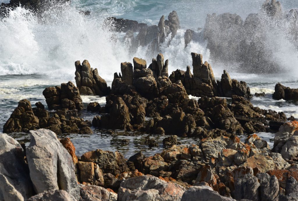 waves splashing on rocks