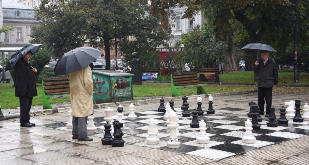 playing chess in the rain